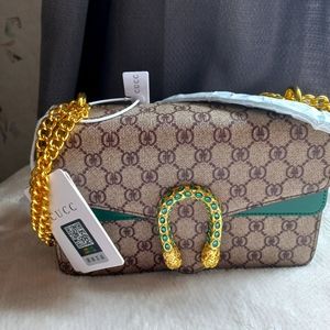 New CUCC green and tan purse.